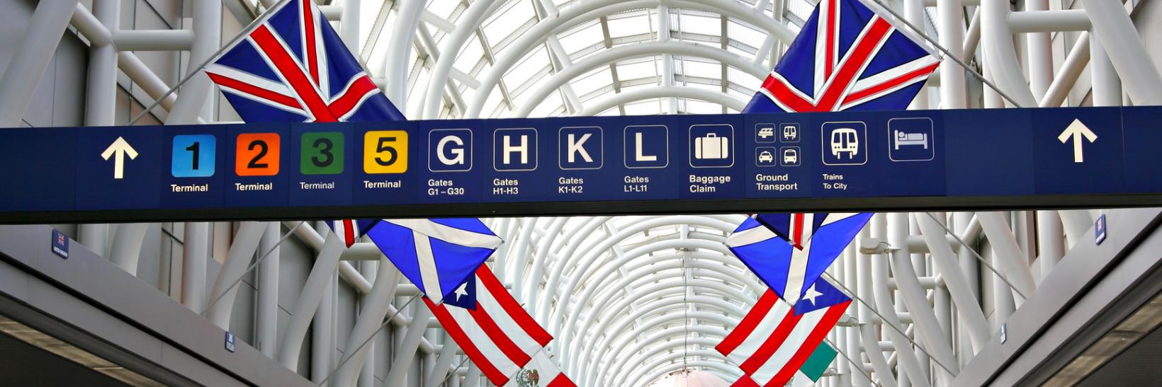 International flags hanging in an airport. 