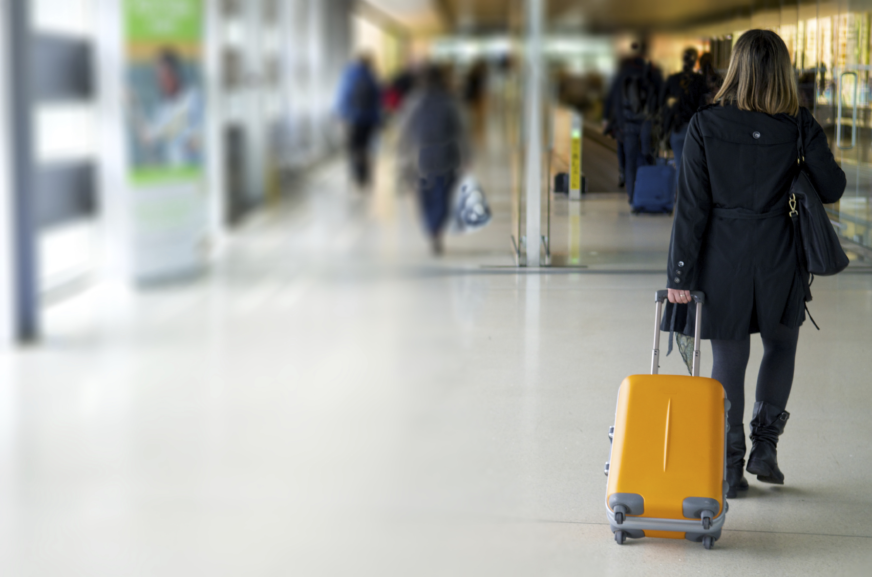 person with suitcase