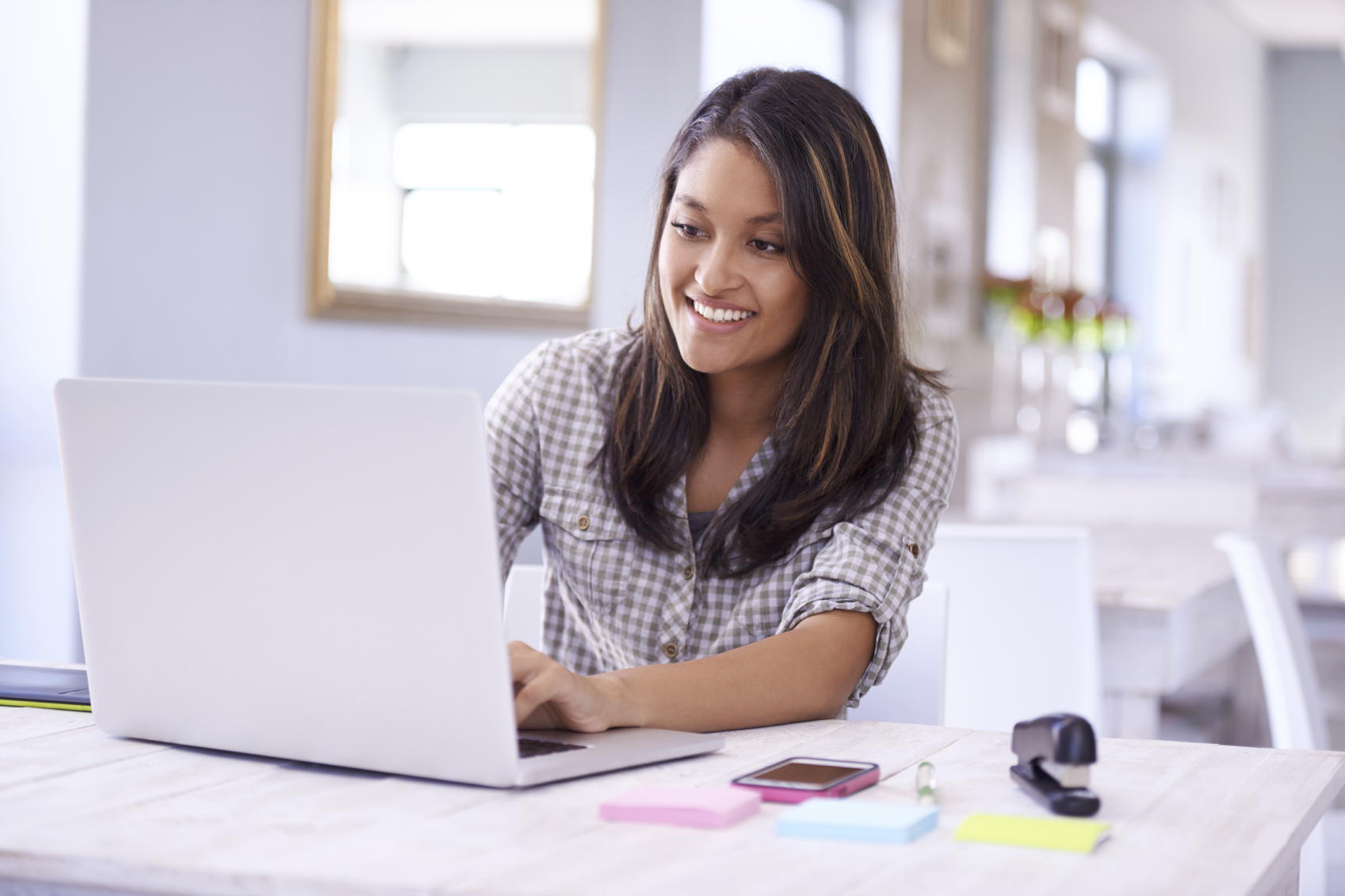 Person typing on a laptop
