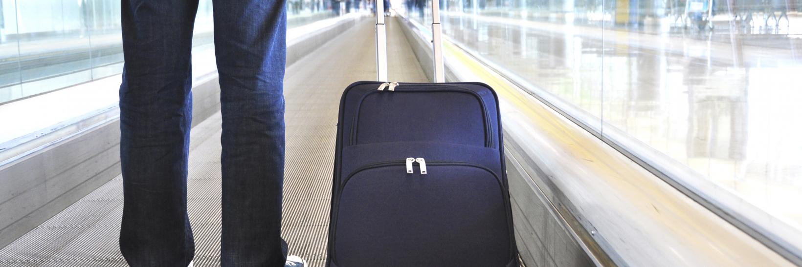 man holding a suitcase