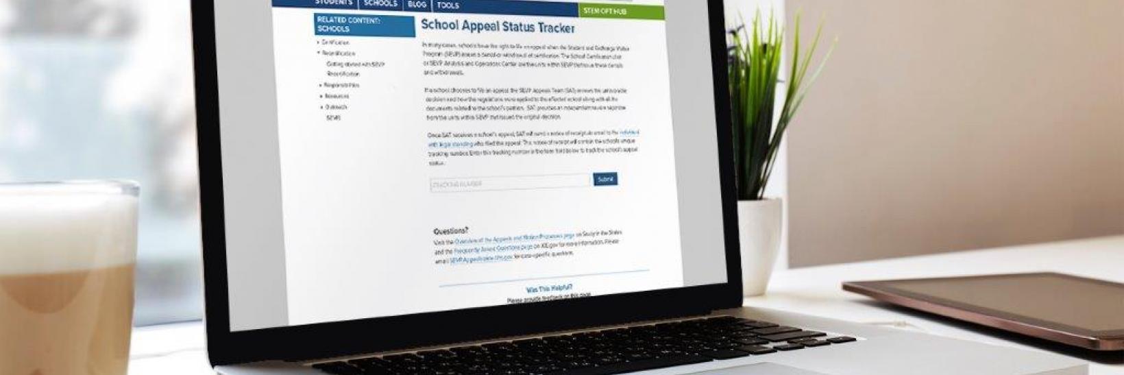 School Appeal Status Tracker on a laptop screen.