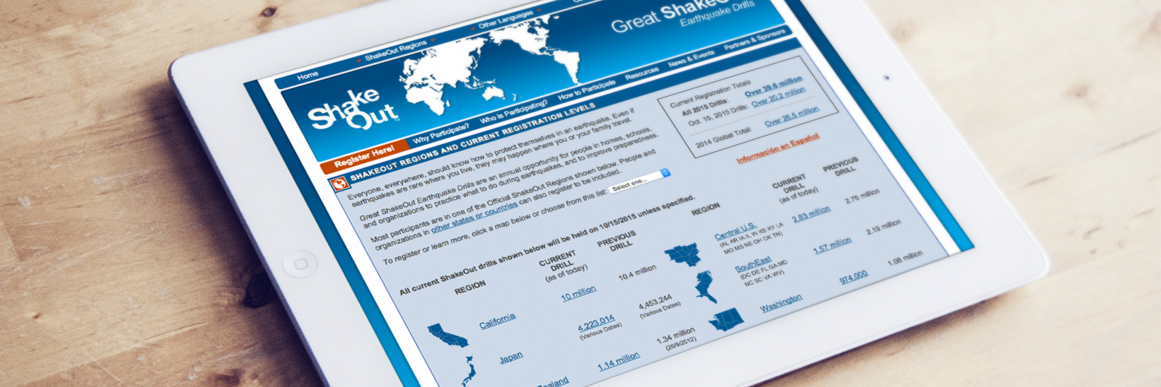 White tablet sitting on table with the Great ShakeOut webpage loaded on browser.