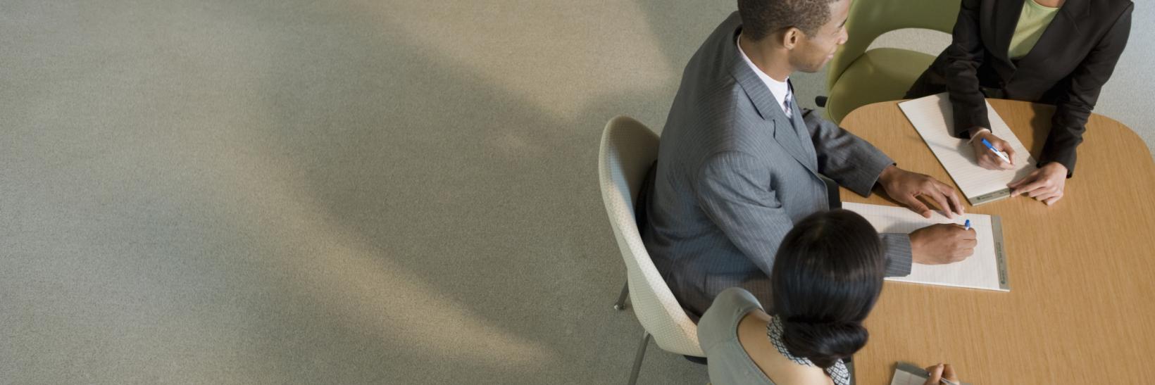 office workers at a meeting