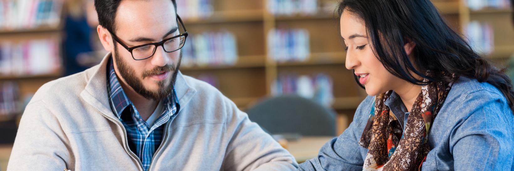 Students studying in a library.