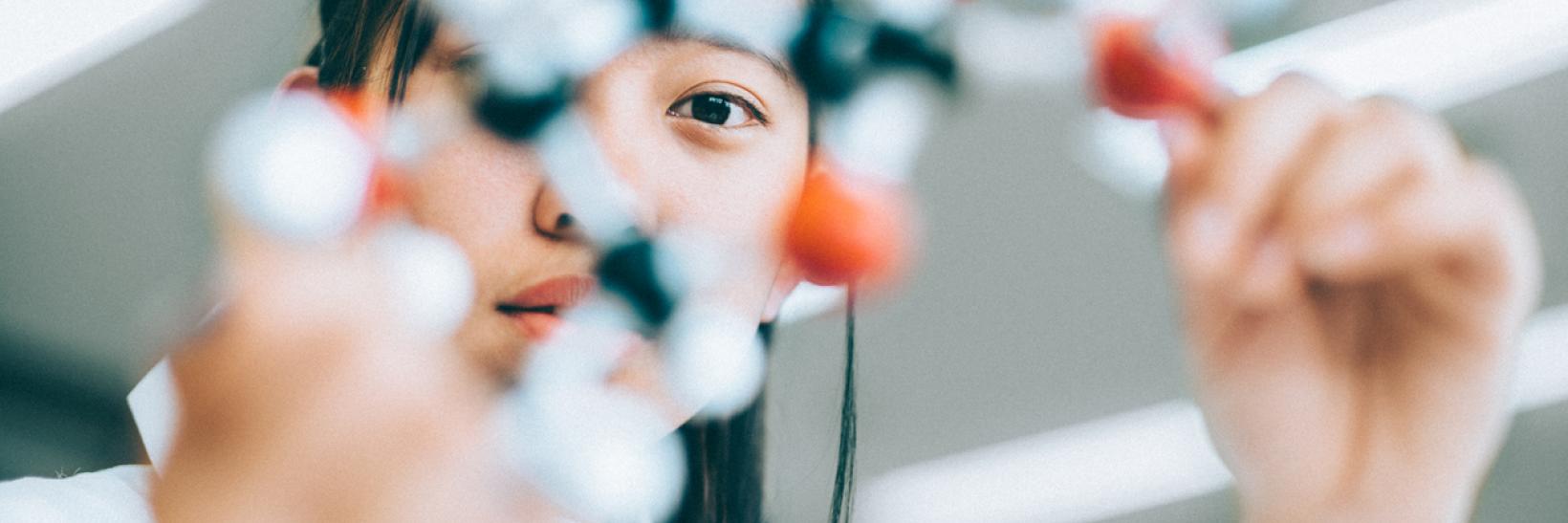 Teenage Student in Chemistry Lab 