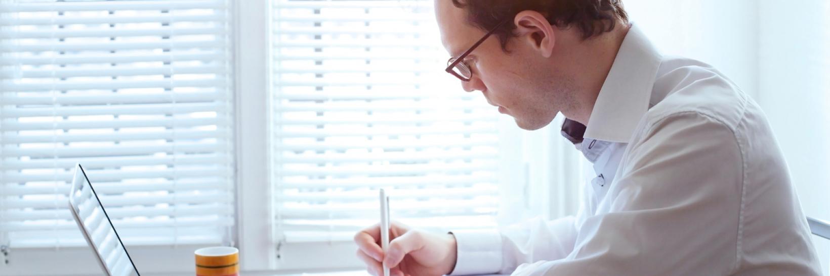 Scientist sitting in front of computer