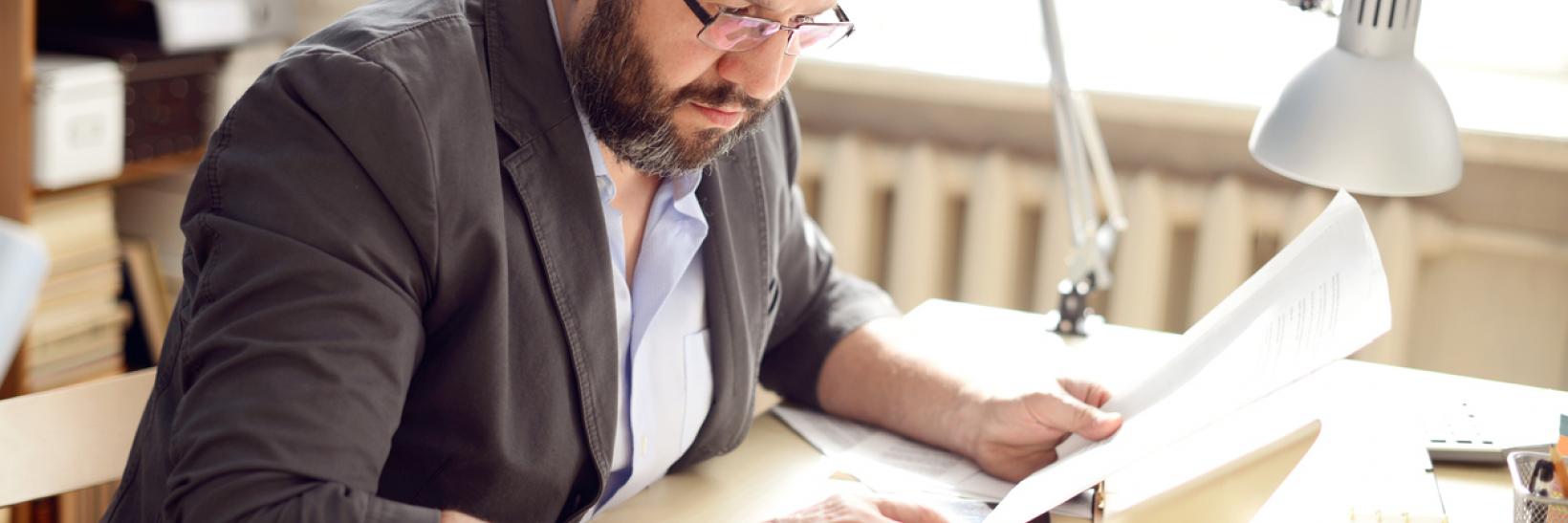 A man working at a desk.