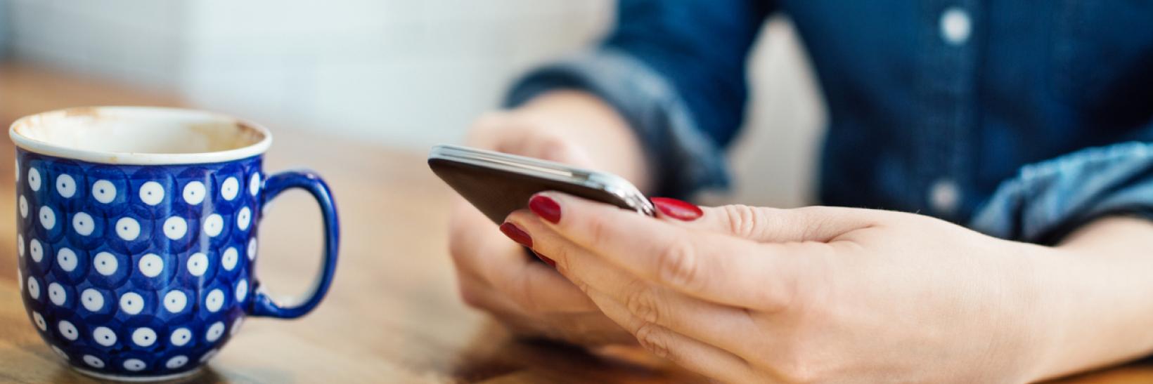 A person viewing their mobile phone.