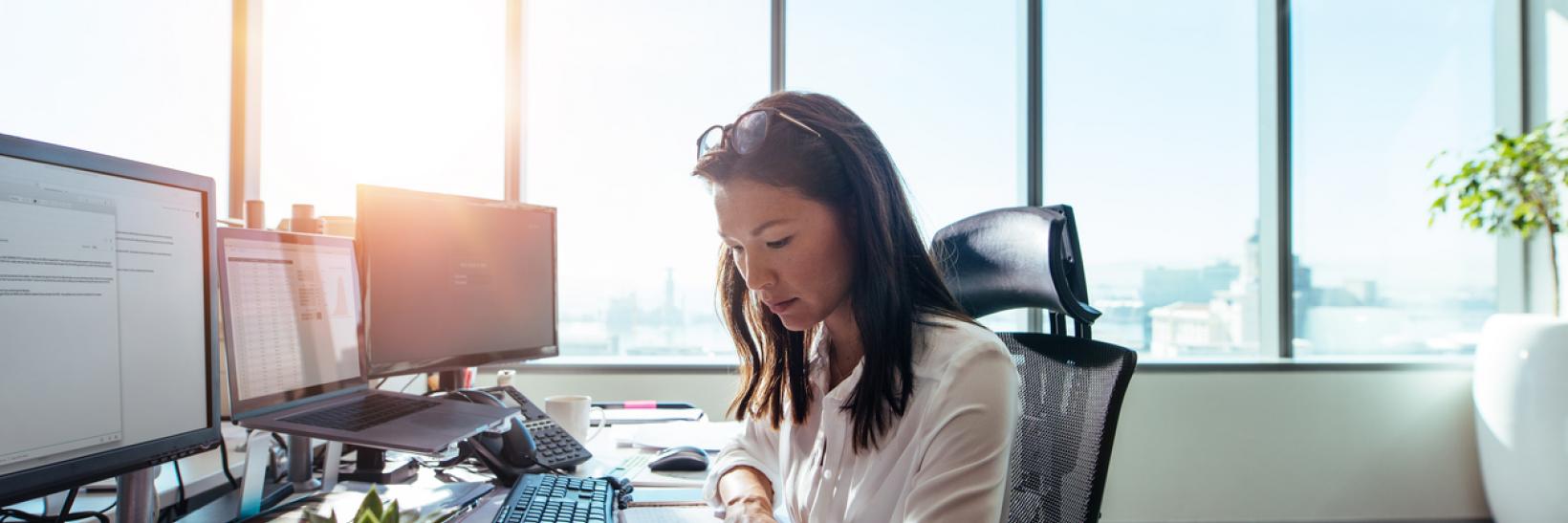 Woman at work in offce.