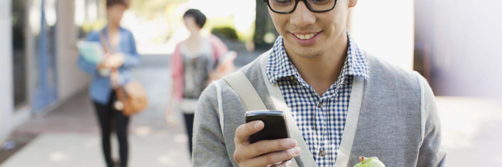 young adult on a cell phone