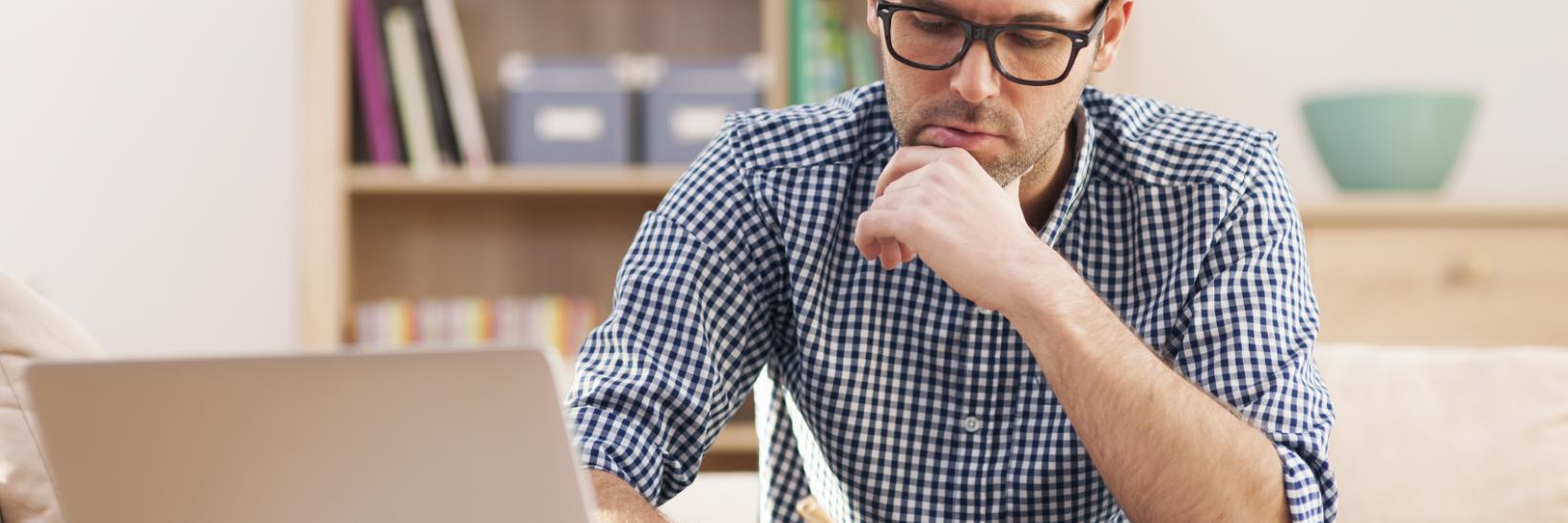 man focusing at work