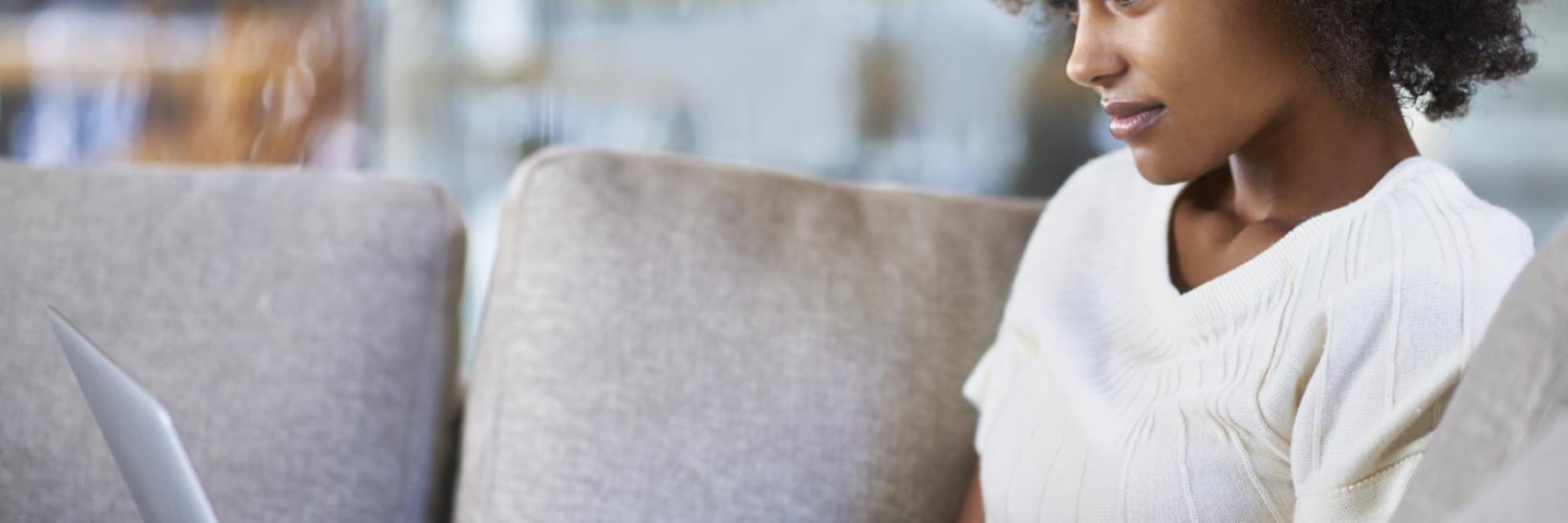 woman sitting at her laptop from home