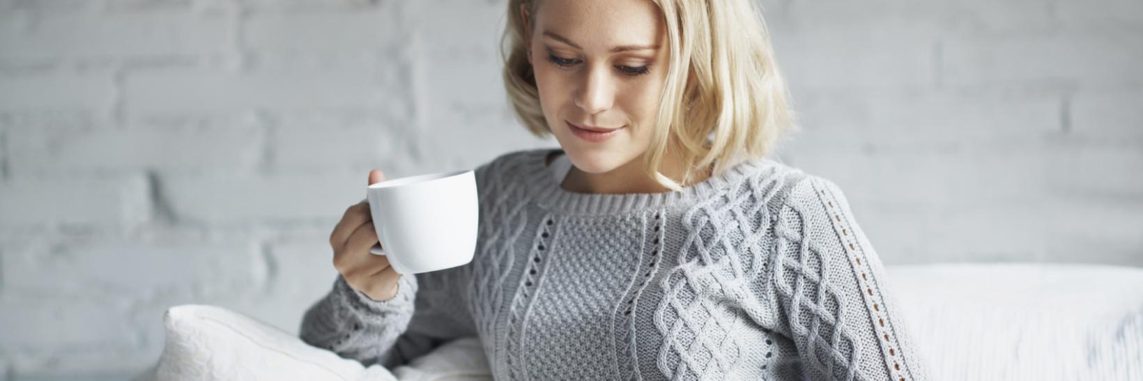 woman reads on a tablet