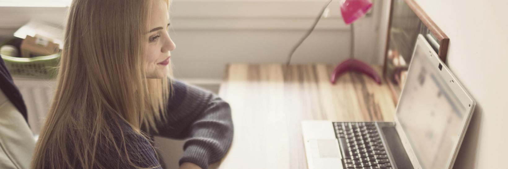 woman checking her computer