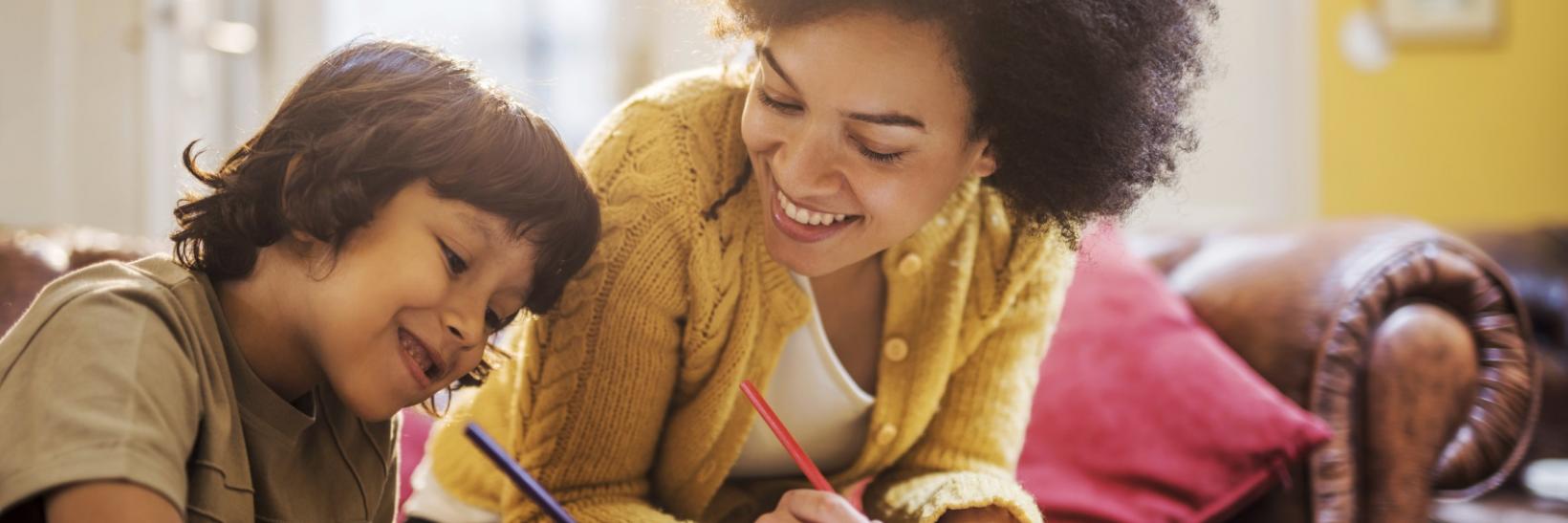 A mother helping her child with homework.