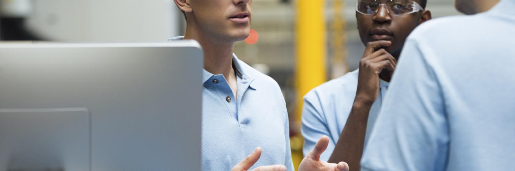 Trainees in a factory.