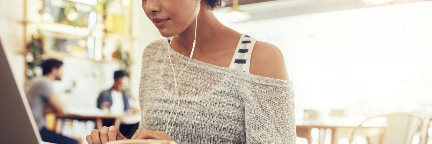 A woman using a computer. 