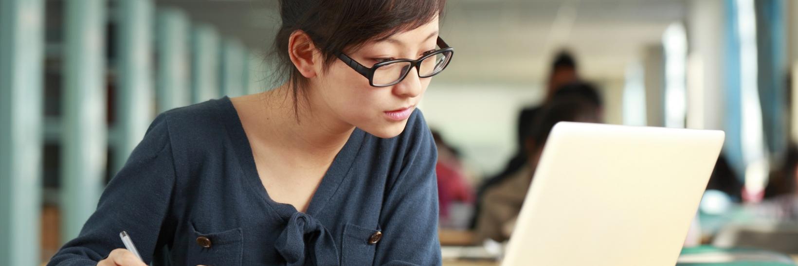 A student studying in the library.