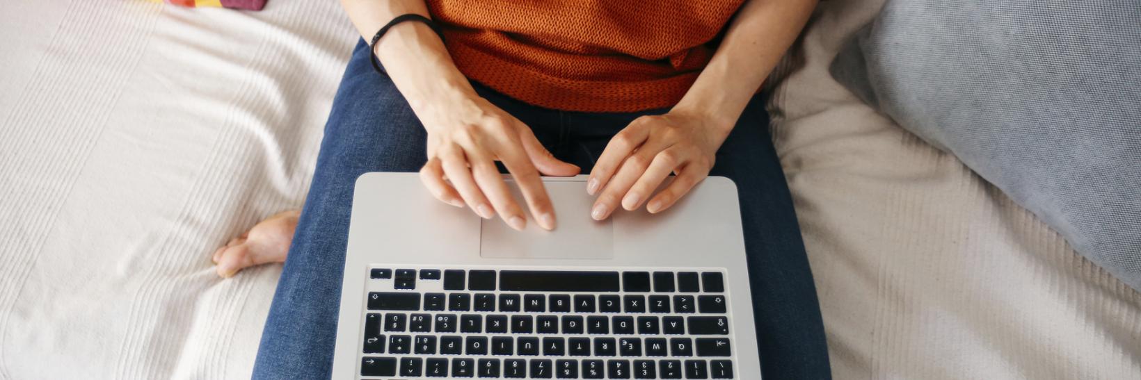 A student using their laptop computer.