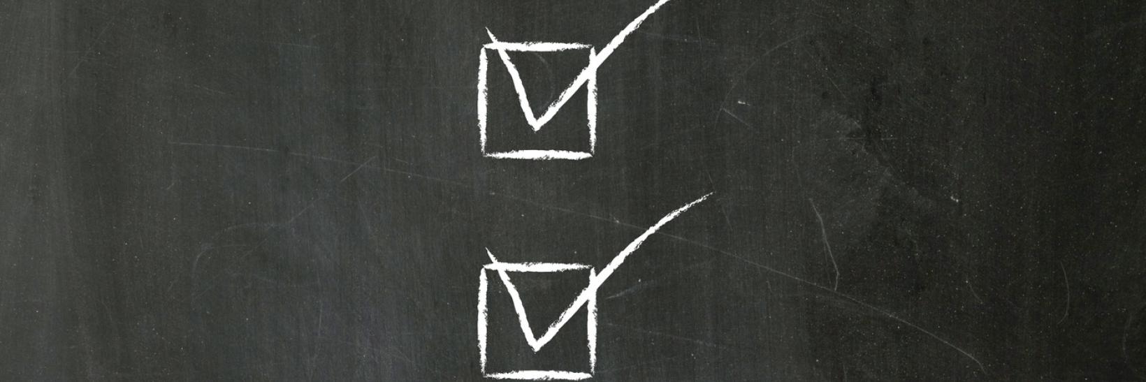 Check list on chalkboard.