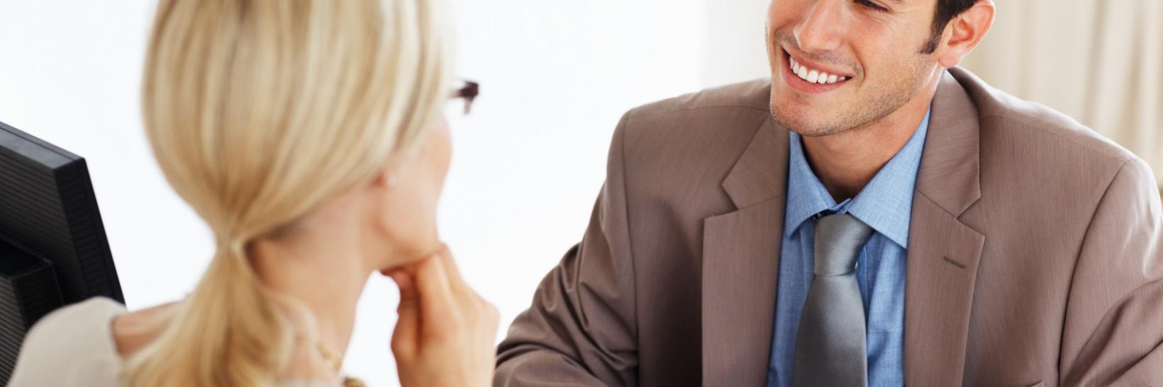 Female student talks to designated school official. 