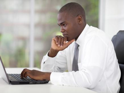 man working at a laptop
