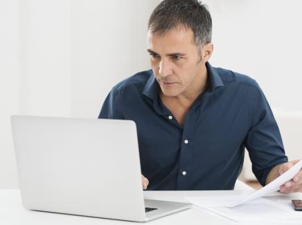 man working at a computer