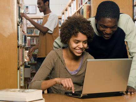 students learning online using a laptop