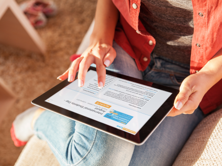 girl reading on a tablet