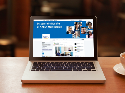 Laptop open to the NAFSA Facebook page. 