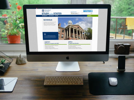 Computer with the Study in the States Schools page on the screen. 