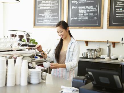 woman working at a coffee shop