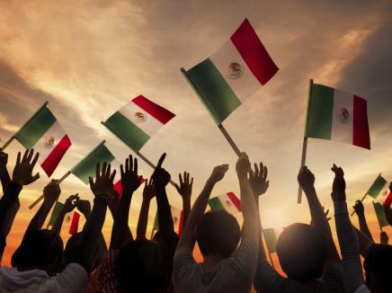 people with the mexican flag