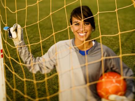 A female soccer goalie.