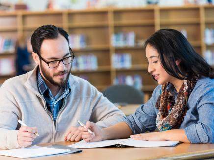 Students studying in a library.