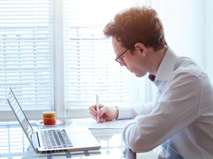 Scientist sitting in front of computer