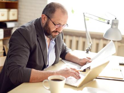 A man working at a desk.