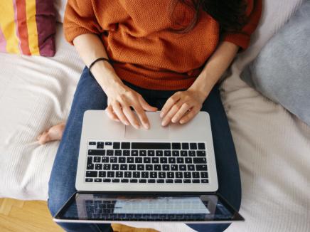 A student using their laptop computer.