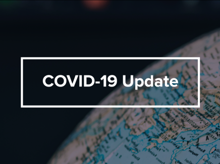 globe with text that reads, "COVID-19 update"