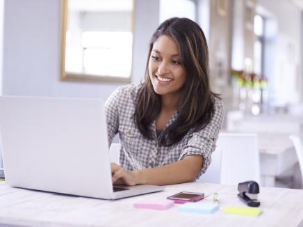 Person typing on a laptop